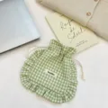 Green checkered drawstring pouch detail, fabric storage bag with cute lace ruffle trim. - Green Plaid