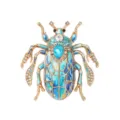 Vintage blue beetle brooch for women, elegant rhinestone enamel insect pin accessory. - Blue