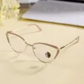 Detailed shot of trendy metal cat-eye glasses frame with photochromic anti-blue light lenses. - Khaki Gold Frame / Photochromic Blue Light Blocking
