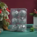 Detailed view of silver glitter Christmas balls with hollow deer design in clear box. - 6 Pieces Set / Silver