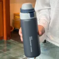 Portable stainless steel thermal water bottle with dual-drink lid for daily lifestyle use. - 500ml / Black