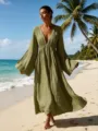 Vestido largo verde oliva con escote en V y manga larga, ideal para las vacaciones. - S / Vestidos / Verde oliva