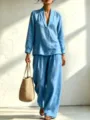 Detail view of casual two-piece set, stylish long sleeve v-neck shirt and wide pants. - Teal
