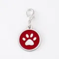 Detailed view of the red enamel pet tag with lobster clasp and cute paw print design. - Dog Paw Round Pendant / Silver Rim Red Enamel With 18mm Alloy Lobster Clasp