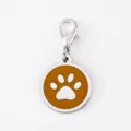 Close-up detail of stainless steel dog paw pendant charm with orange enamel and lobster clasp. - Dog Paw Round Pendant / Silver Rim Orange Enamel With 18mm Alloy Lobster Clasp