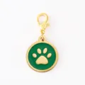 Detailed shot of green enamel dog paw charm with gold lobster clasp, smooth metal finish. - Dog Paw Round Pendant / Gold Rim Green Enamel With 18mm Alloy Lobster Clasp