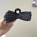 Élégante pince à cheveux nœud en tissu floral, design rétro multicouche pour coiffures. - Pince Nœud Floral Violet