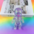 Detail view of purple glitter squeeze doll, soft stress relief toy with cute baby design. - Maltose Glitter Ugly Doll [Purple]