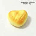 Heart shaped bread squishy toy, PU foam slow rebound stress relief toy for daily relaxation. - Heart-Shaped Bread