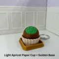 3D gedruckter schokoladenstil fidget clicker schluesselanhänger mit becher und goldener basis. - Dubai Weicher Keks Hellaprikosen Papierbecherhalter mit Goldtablett
