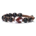 Hand-woven Dzi bead red agate tiger tooth bracelet detail shot for men and women - Obsidian