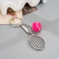 Metal tennis racket keychain with pink fuzzy mini tennis ball pendant, perfect bag charm gift - Rose Red