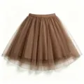 Detailed view of the brown multi-layer tulle mesh skirt, showing exquisite layered fabric. - Coffee
