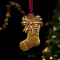Gold Christmas stocking hanging ornament resin tree decor with bow and gift box design. - Socks / Gold