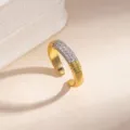 Exquisite gold open ring featuring sparkling rhinestones and delicate geometric patterns. - Ring