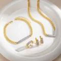 Close-up detail of luxury two-tone geometric rhinestone jewelry set with curb chain. - Four-Piece Set / Two Colors