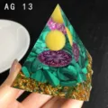 Handmade resin crystal pyramid ornament with crushed malachite and gold foil for home decor. - AG 13