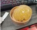 Quetschi Brötchen Anti-Stress Spielzeug mit Dämpfer, niedliches Sensorik-Spielzeug. - Transparentes Gold