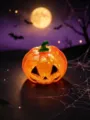 Halloween Kürbis Quetschspielzeug mit Glitzer und LED Leuchteffekt für effektiven Stressabbau - OPP-Beutel / Orange