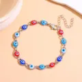 Trendy evil eye charm bracelet with colorful beads, silver-plated metal link chain fashion jewelry. - Multi-color Silver