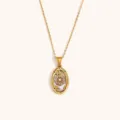 Stainless steel gold plated oval tarot card pendant necklace for women, minimalist chic style. - Gold Wheel