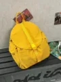 Sac à dos de voyage imperméable en nylon de grande capacité pour loisirs en jaune - L / Jaune