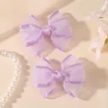 Vue détaillée de pinces à cheveux nœud en organza double couche violet clair doux. - 2 Pièces/Paquet / Violet