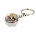 Catholic Saint Clare religious keychain with glass dome pendant, durable metal keyring. - St. Clare