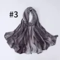 Detail view of the soft gradient silk-feel long scarf, showing the fine drape texture clearly. - Style #3
