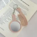 Porte-clés miroir et peigne en acétate rose, charm de sac portable et accessoire élégant. - Couleur Thé au Lait