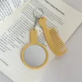 Ensemble porte-clés miroir et peigne jaune mignon de couleur unie, accessoire de sac portable. - Jaune lait