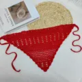 Close-up detail of red crochet triangular bandana, hollow knit hair scarf display. - One Size / Red Bandana