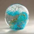 Handmade glass paperweight with blue ocean wave and gold flakes, sphere ornament for home decor. - Blue Gold Sand