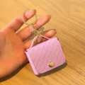 Roze PU gewatteerde mini tas sleutelhanger, schattig oordopjeshoesje en stijlvolle tasbedel. - Roze