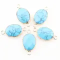 Connecteurs de pierre ovales turquoise bleue à double anneau pour fabrication de bijoux. - 28x15mm / Turquoise Unique