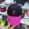 Stylish color-block baseball cap featuring pink embroidered letters and contrast brim. - Adjustable / Black