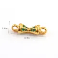 Detail view of golden bow jewelry connector with green stones, DIY craft accessory for bracelets. - Silver Base Green Rhinestone