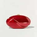 Red wavy acrylic hard shell evening clutch bag detail, elegant gold top clasp accent. - Red