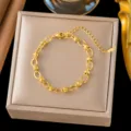 Pulsera de cadena de acero de titanio dorado, elegante accesorio de joyería para mujeres. - 【e2576】cross embossed bracelet gold