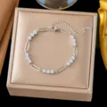 Elegante pulsera plateada con elementos florales y circonitas brillantes para mujeres - 【e2575-1】interval 3 diamonds bracelet steel color