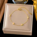 Elegante pulsera de acero de titanio dorado con cuentas facetadas, joya minimalista. - 【e2583】4 ball bracelet gold