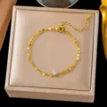 Elegante pulsera de acero de titanio de doble capa chapada en oro de 18k con cristal brillante. - 【e2574】double-layer lip chain single diamond bracelet - gold