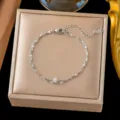 Pulsera de cadena de doble capa con una sola piedra de circonita, tono plateado. - 【e2574-1】double-layer lip chain single diamond bracelet - steel color