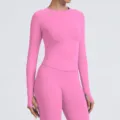 Seamless pink long sleeve workout top and yoga leggings set for women, breathable fitness activewear. - Flower Pink
