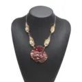 Exquisite artistic floral pendant necklace with layered burgundy flower and gold leaf chain. - Red