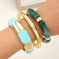 Chic stacked bracelet set featuring resin and metal bangles for women fashion style. - Bamboo Ring Resin Bangle Set (6764601HB)