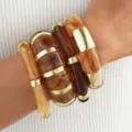 Acrylic resin stacked bracelet set in amber and gold tones, stylish fashion jewelry variant. - Patchwork Bangle (6848801HB)