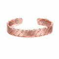 Bracciale magnetico in rame oro rosa, variante polsino intrecciato ritorto regolabile. - Rame