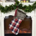 Classic plaid Christmas stocking with soft faux fur cuff and hanging loop for holiday decor. - Dark Colored Plaid Stocking
