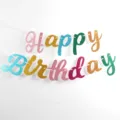 Glitter birthday banner detail shot, colorful Happy Birthday cutout letters for party decor. - Rainbow Birthday Banner